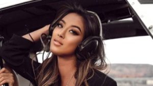 Taylor Ping, portrait with headphones
